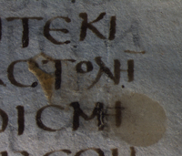 Detail showing wax accretion on Quire 83, folio 4 verso